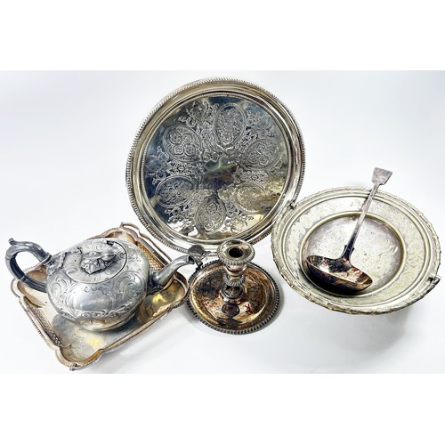 195 - A miscellaneous collection of silver plated table ware including, candlesticks, tea services, salver... 