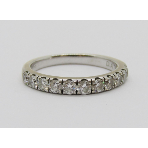 403 - 18ct white gold diamond half eternity ring, set with eleven stones totalling 0.75ct approx, size M, ... 