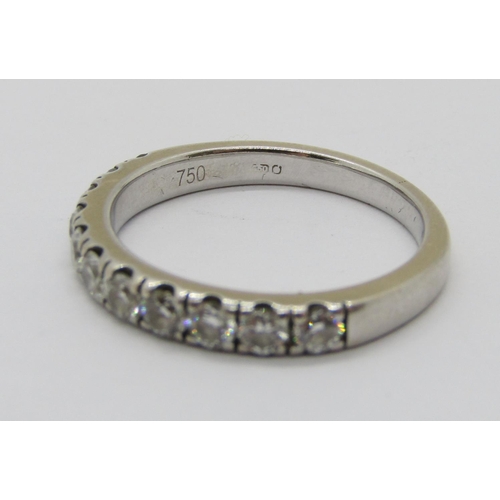 403 - 18ct white gold diamond half eternity ring, set with eleven stones totalling 0.75ct approx, size M, ... 