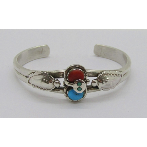 413 - Native American Zuni silver, coral and turquoise snake design bracelet by Effie Calavaza (sold on be... 