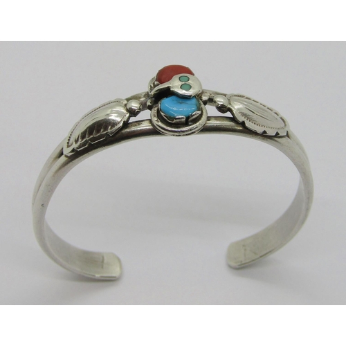 413 - Native American Zuni silver, coral and turquoise snake design bracelet by Effie Calavaza (sold on be... 