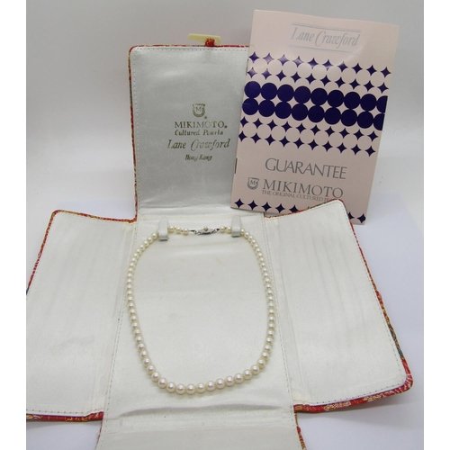 415 - Mikimoto pearl necklace with silver clasp, retailed by Lane Crawford, Hong Kong, sixty-eight pearls ... 