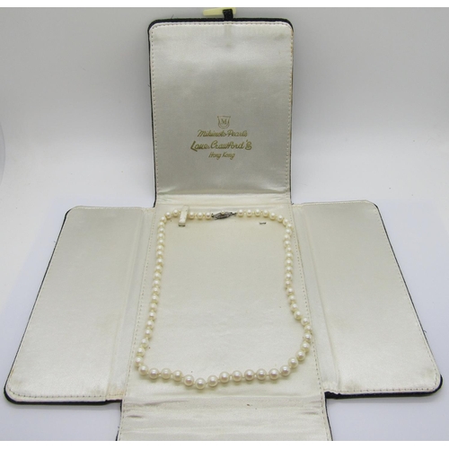 416 - Mikimoto pearl necklace with silver clasp, retailed by Lane Crawford, Hong Kong, sixty-six pearls pl... 