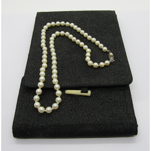 416 - Mikimoto pearl necklace with silver clasp, retailed by Lane Crawford, Hong Kong, sixty-six pearls pl... 