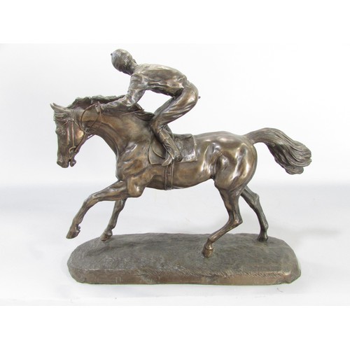 612 - “ Still in the race” a group of three bronze resin race horse and jockey studies, 21cm high approxim... 