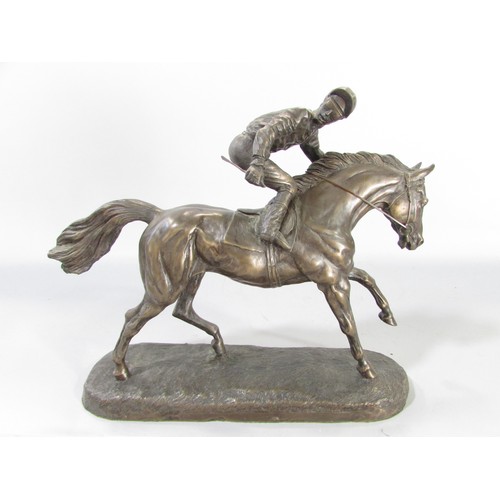 612 - “ Still in the race” a group of three bronze resin race horse and jockey studies, 21cm high approxim... 