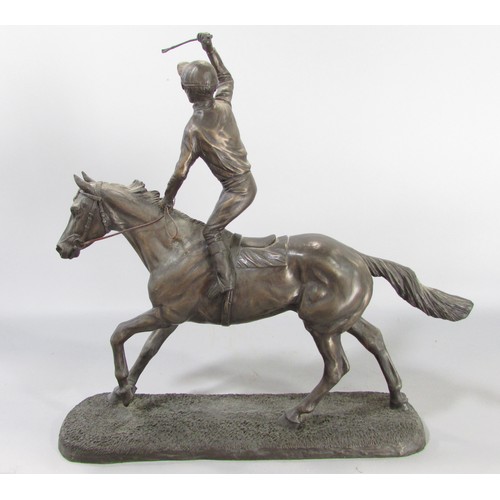 613 - “First, second and third” a group of three bronze resin race horse and jockey studies, approximately... 