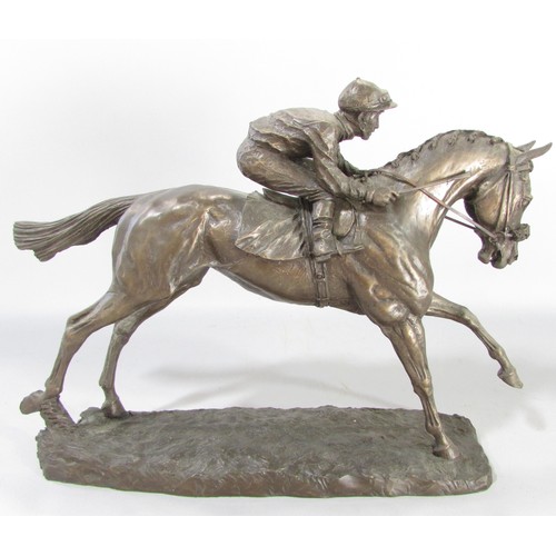 613 - “First, second and third” a group of three bronze resin race horse and jockey studies, approximately... 