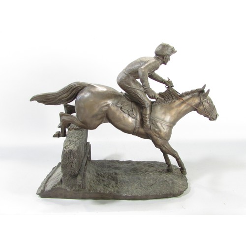 614 - “ Before the race” and “Over the last” two bronze resin race horse and jockey studies, 27cm high app... 