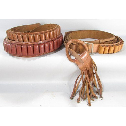 615 - Four leather shot gun cartridge belts and a leather pheasant ring holder.