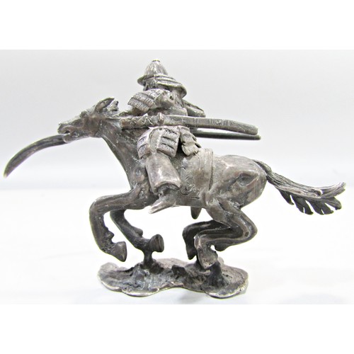 629 - Three white metal Dutch made Japanese military figures, one on horse back, one advancing, the squatt... 