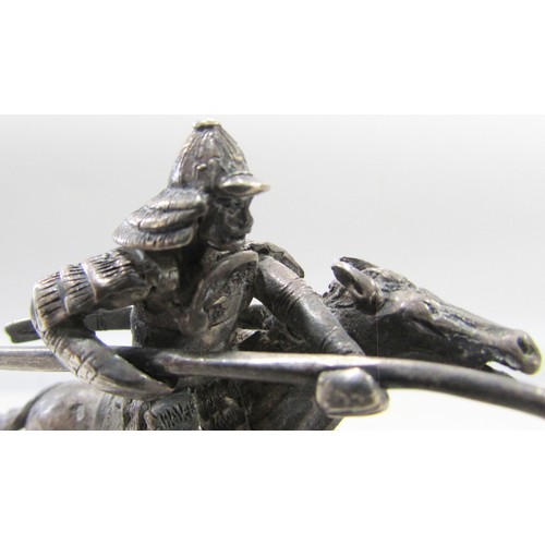 629 - Three white metal Dutch made Japanese military figures, one on horse back, one advancing, the squatt... 