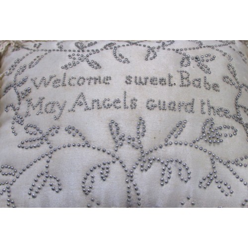 633 - A Georgian babies pin stuck pillow “Welcome sweet babe. May angels guard thee” silk with fringe, 18c... 