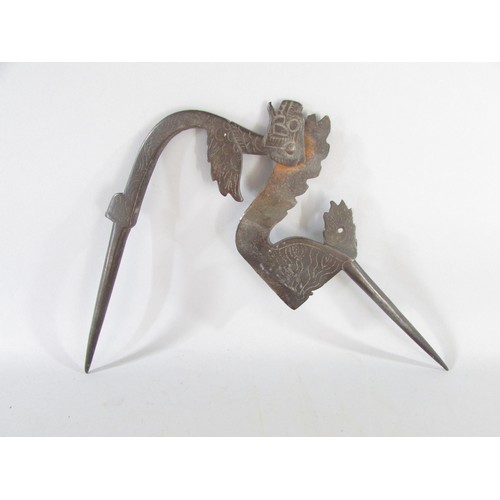 631 - A 19th century stylised dragon Betel leaf cutter, an Asian counterintuitive ironwork lock, an antiqu... 