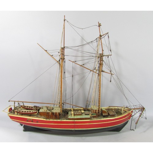 622 - A highly detailed wooden model of a square rigged schooner name Lilla Dan (as found) 60cm long.