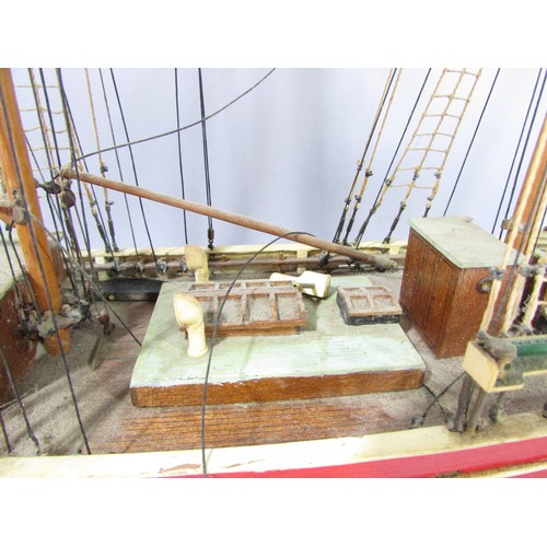 622 - A highly detailed wooden model of a square rigged schooner name Lilla Dan (as found) 60cm long.