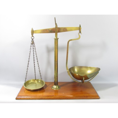 623 - A 19th century set of brass scales on a mahogany stand with a single drawer, made by Ge Grave, Short... 