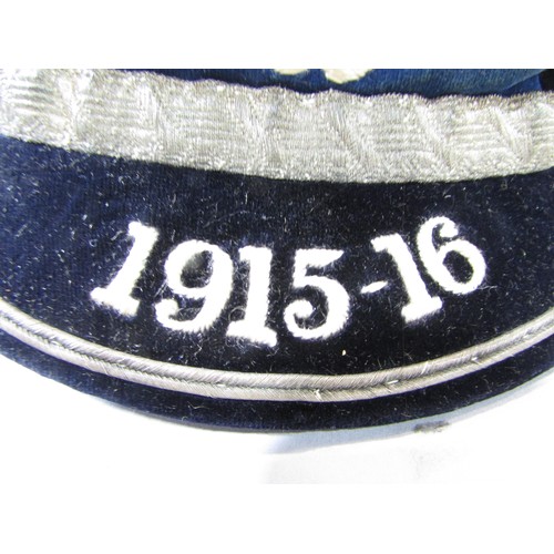 618 - An early 20th century blue velvet and gold braid tasseled Rugby Football Honours Cap dated 1915-16 i... 