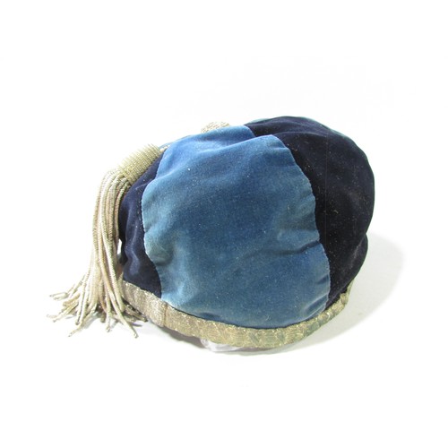 618 - An early 20th century blue velvet and gold braid tasseled Rugby Football Honours Cap dated 1915-16 i... 