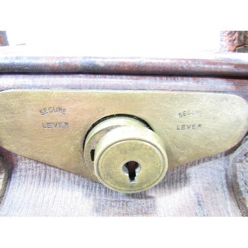 636 - A vintage brown leather Gladstone bag, decent stitching and handles, working brass clasps, missing b... 