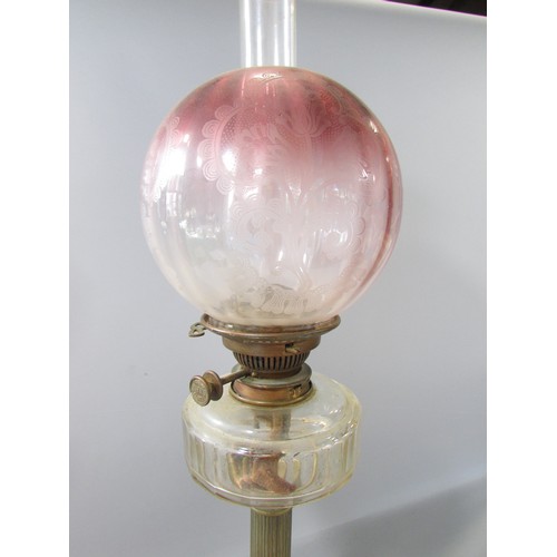 638 - A Victorian reeded brass column oil lamp with receding purple glass shade and Hinks No 2 lever, 65cm... 