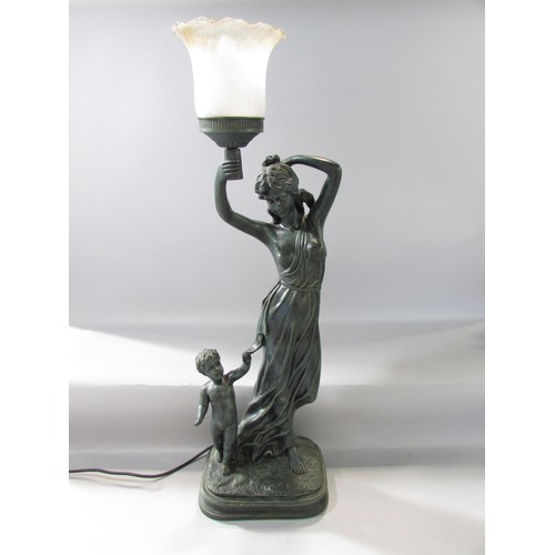 640 - A bronzed effect table lamp of a Classical draped woman arm aloft with lamp and solitary naked infan... 