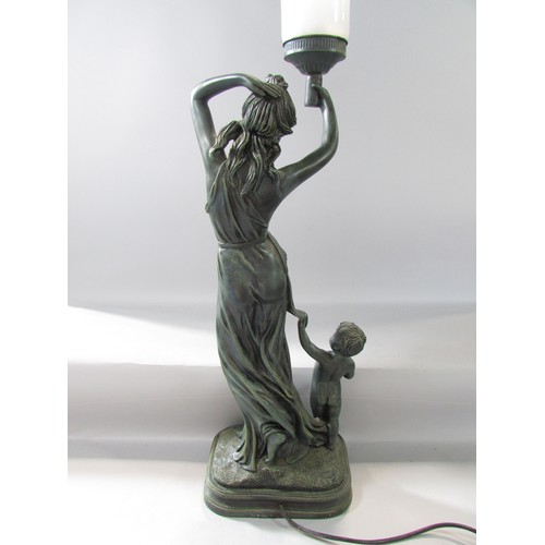 640 - A bronzed effect table lamp of a Classical draped woman arm aloft with lamp and solitary naked infan... 