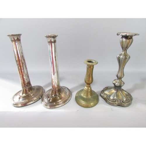 644 - A Pair of silver on copper candlesticks and two others.