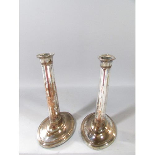 644 - A Pair of silver on copper candlesticks and two others.