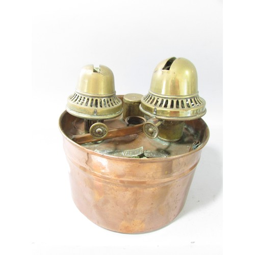 651 - A Wrennall double burner oil lamp, together with a 19th century wooden handler brass tinder box with... 