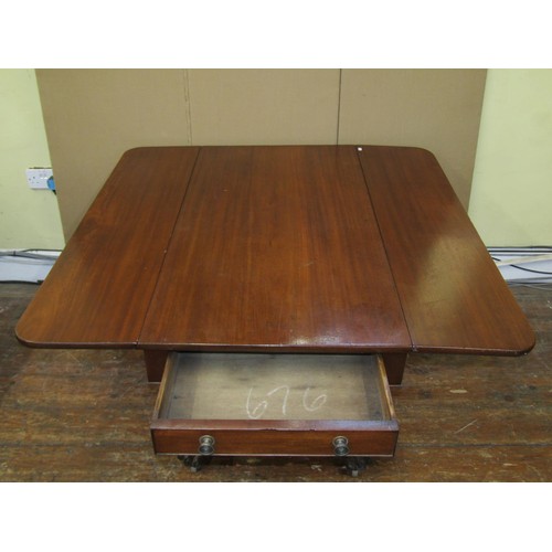 1610 - A Regency mahogany Pembroke breakfast table on platform base with lions paw feet, 75cm high x 115cm ... 