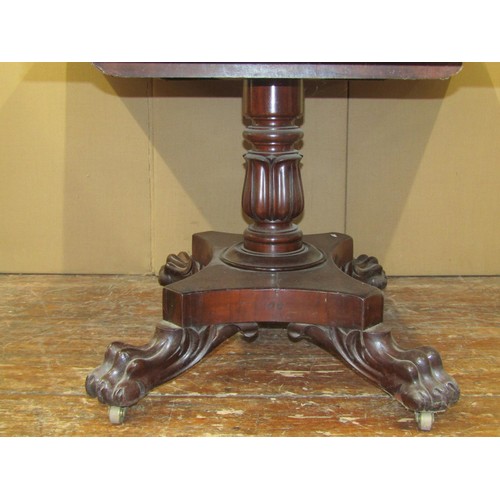 1610 - A Regency mahogany Pembroke breakfast table on platform base with lions paw feet, 75cm high x 115cm ... 