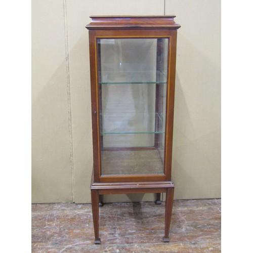 1618 - An inlaid Edwardian mahogany vitrine, of square cut form with glazed sides and shelves on square cut... 