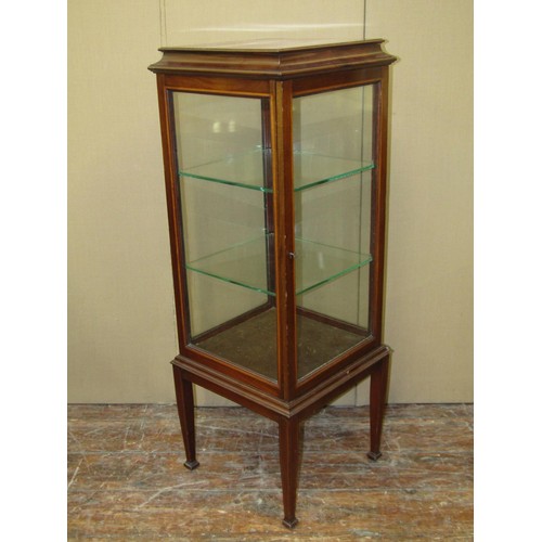 1618 - An inlaid Edwardian mahogany vitrine, of square cut form with glazed sides and shelves on square cut... 