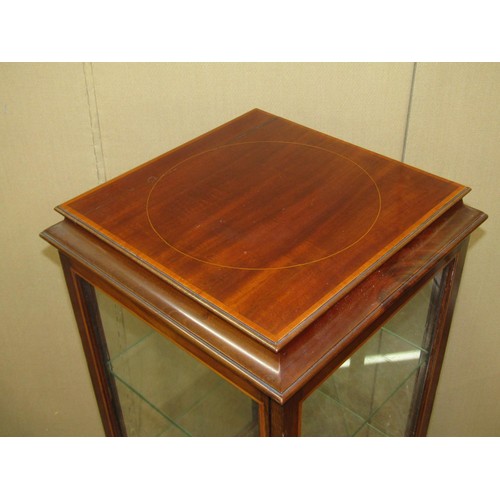 1618 - An inlaid Edwardian mahogany vitrine, of square cut form with glazed sides and shelves on square cut... 