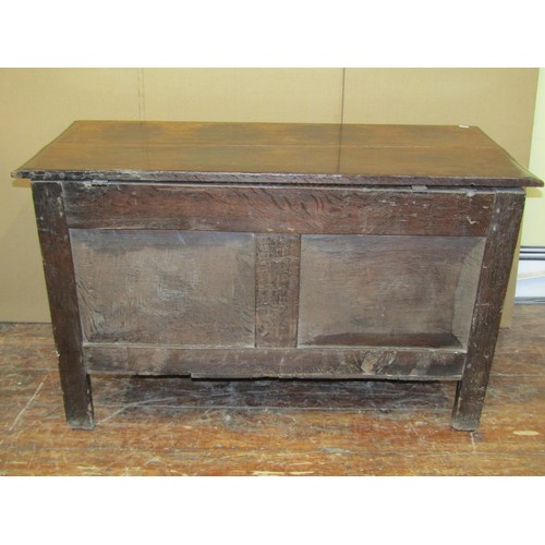 1619 - A 17th century oak coffer of neat proportions, with carved detail, 65cm high x 110cm wide x 50cm dee... 