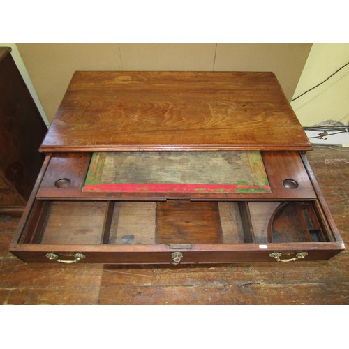 1622 - A Georgian mahogany kneehole desk enclosing eight drawers, the top drawer with fitted interior, with... 