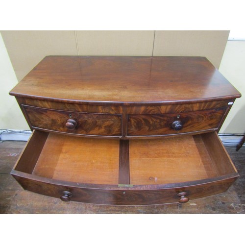 1624 - An early Victorian mahogany bow fronted chest of three long and two short drawers with well matched ... 