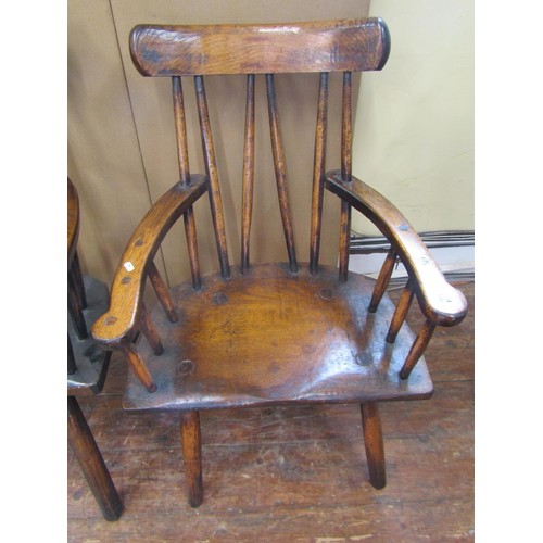 1629 - A set of four Irish Gibson chairs in oak, in a rustic style, 63cm wide (seat) 112cm high x 38cm deep... 