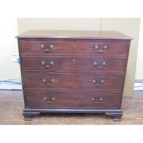 1635 - A Georgian mahogany chest of 3 long drawers, (presented as four) the top drawer of double depth, on ... 