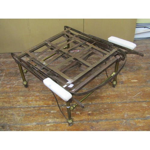 1641 - A 19th century folding campaign chair/bed in brass and steel