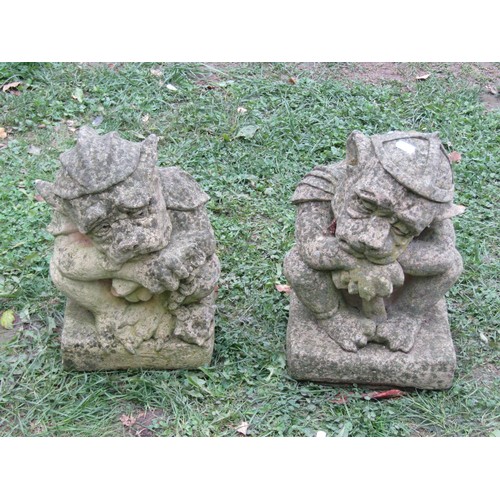 1095 - Two weathered cast composition stone garden ornaments in the form of seated sleeping gargoyles 38 cm... 