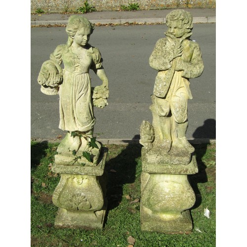 1054 - Three weathered cast composition stone garden ornaments representing three of the four seasons raise... 