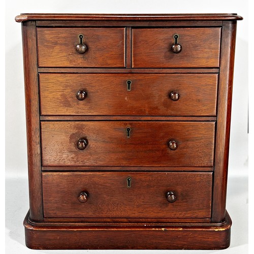 668 - A Victorian mahogany apprentice chest of drawers, two over three long graduated drawers, 30cm wide x... 