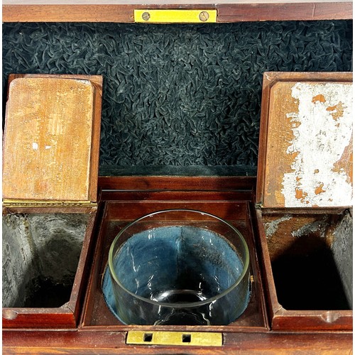 672 - A Regency mahogany tea caddy, with two mahogany caddies and glass mixing bowl, 30cm wide.