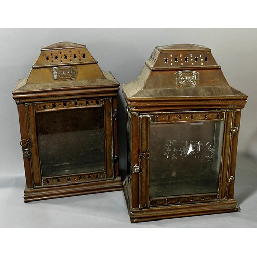 659 - A pair of antique Limehouse Co Lamps, with a hinged glazed door.