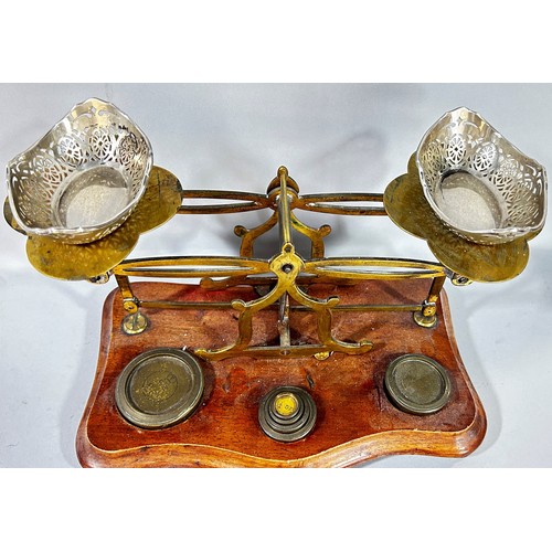 681 - A set of Victorian letter scales with some weights and a pair of small silver dishes with pierced de... 