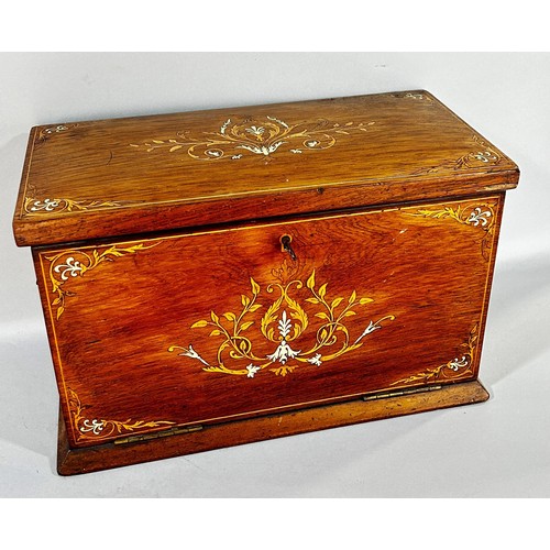 680 - An inlaid Edwardian stationery box, with a hinged top releasing a fall front red Morocco leather lin... 