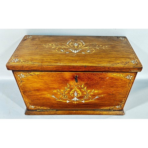 680 - An inlaid Edwardian stationery box, with a hinged top releasing a fall front red Morocco leather lin... 