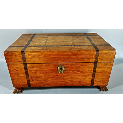 692 - An old oak box with rosewood banding and two sections inside raised on claw feet. 33cm wide.